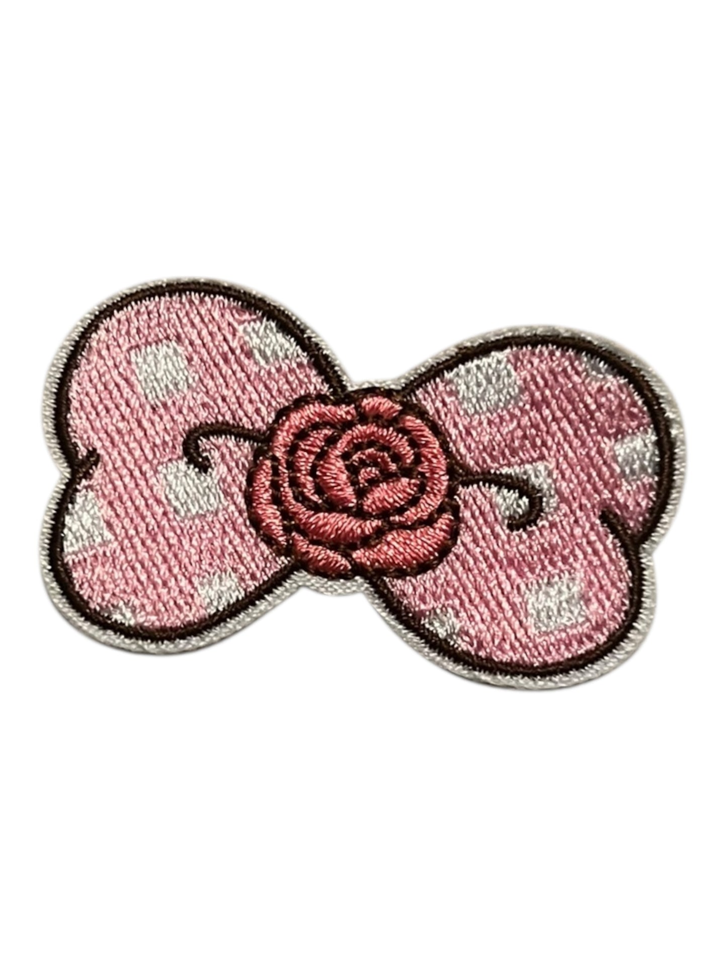 Small pink bow with rose