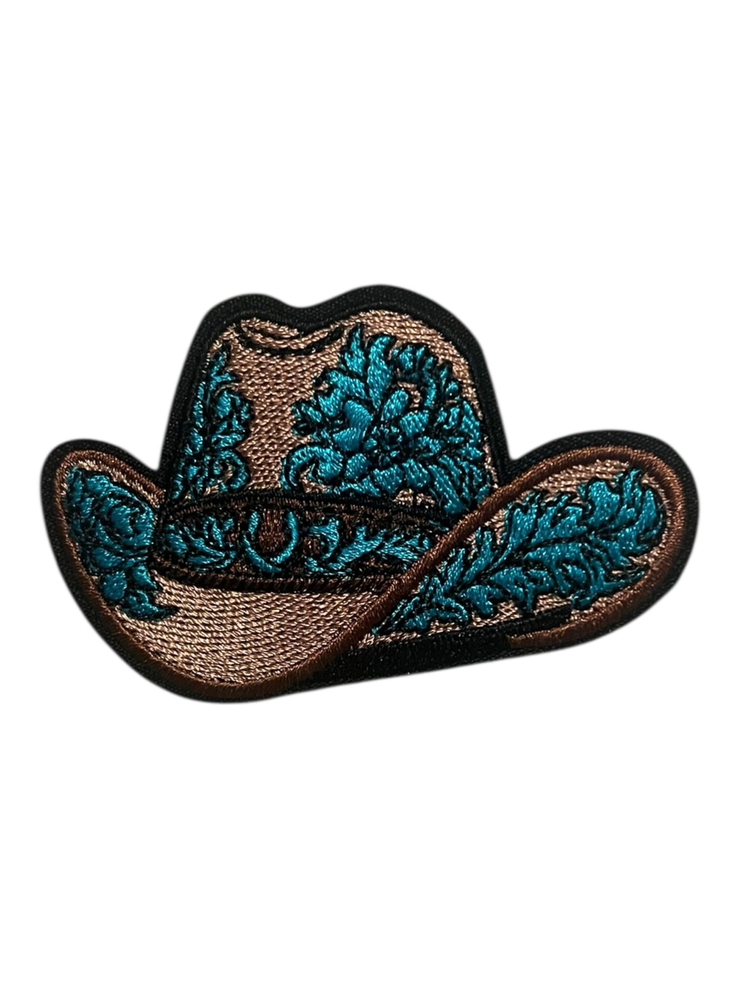 Tan and turquoise cowboy hat