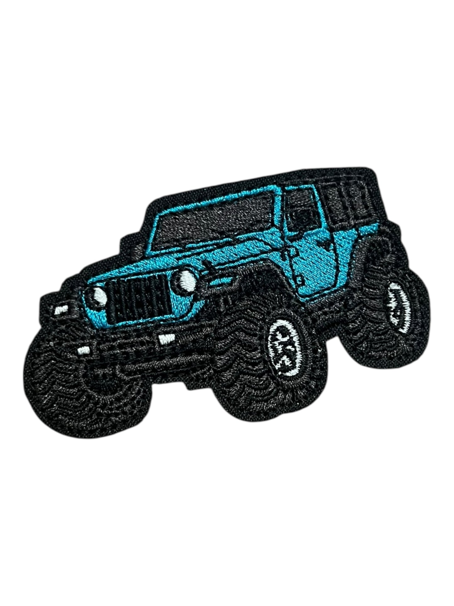 Turquoise off road jeep