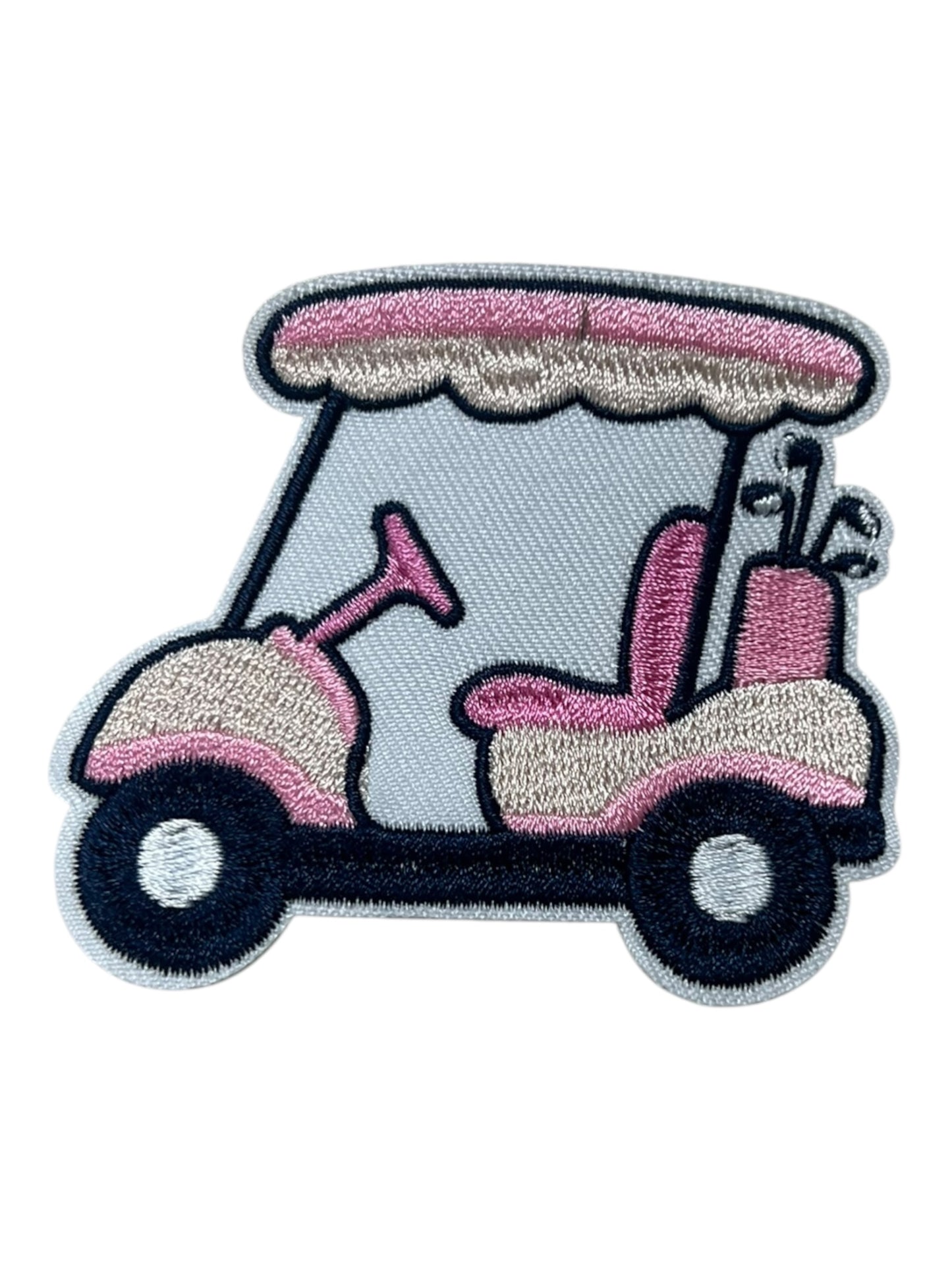 Pink and Tan golf cart