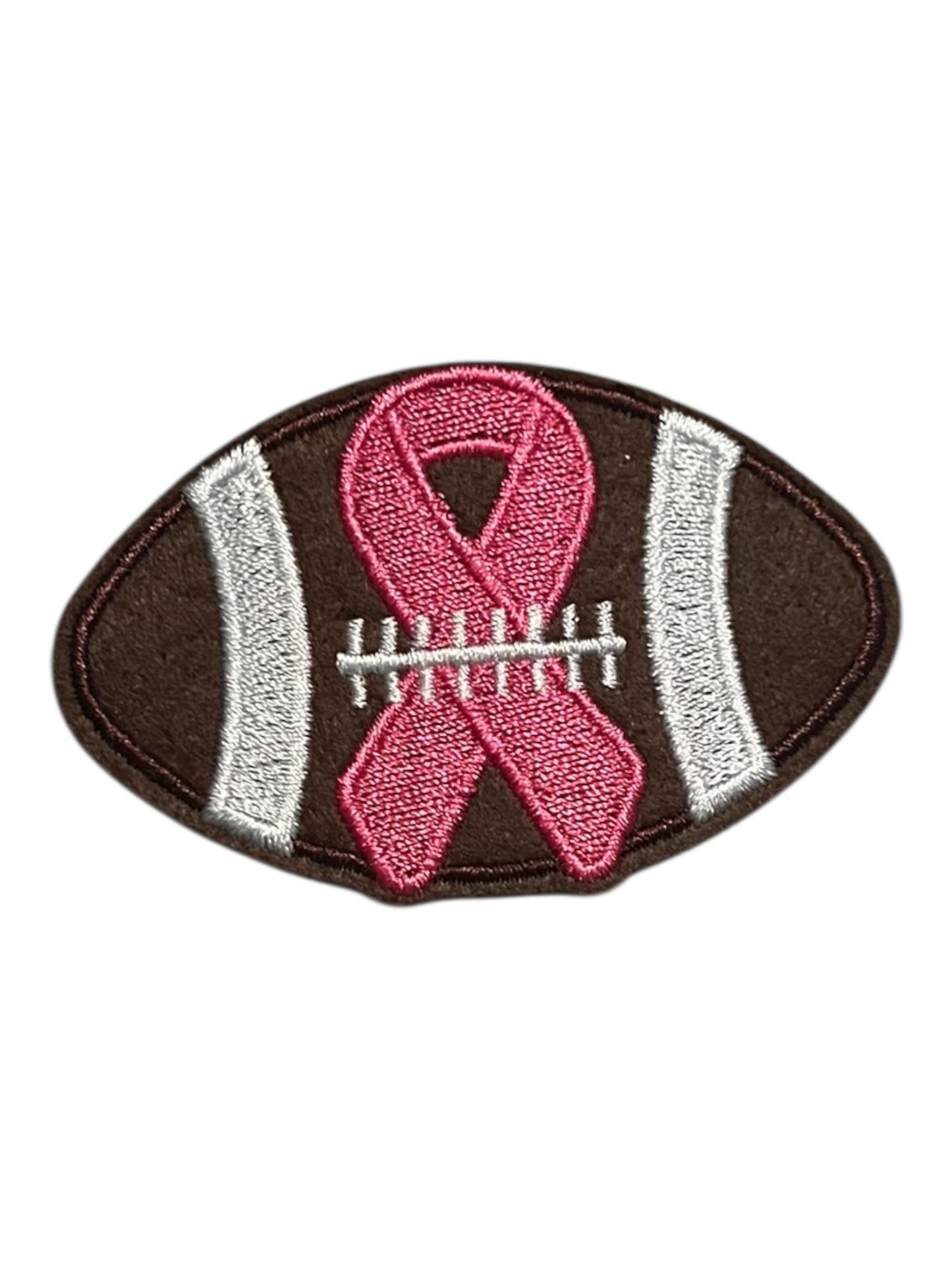 Football with pink breast cancer bow