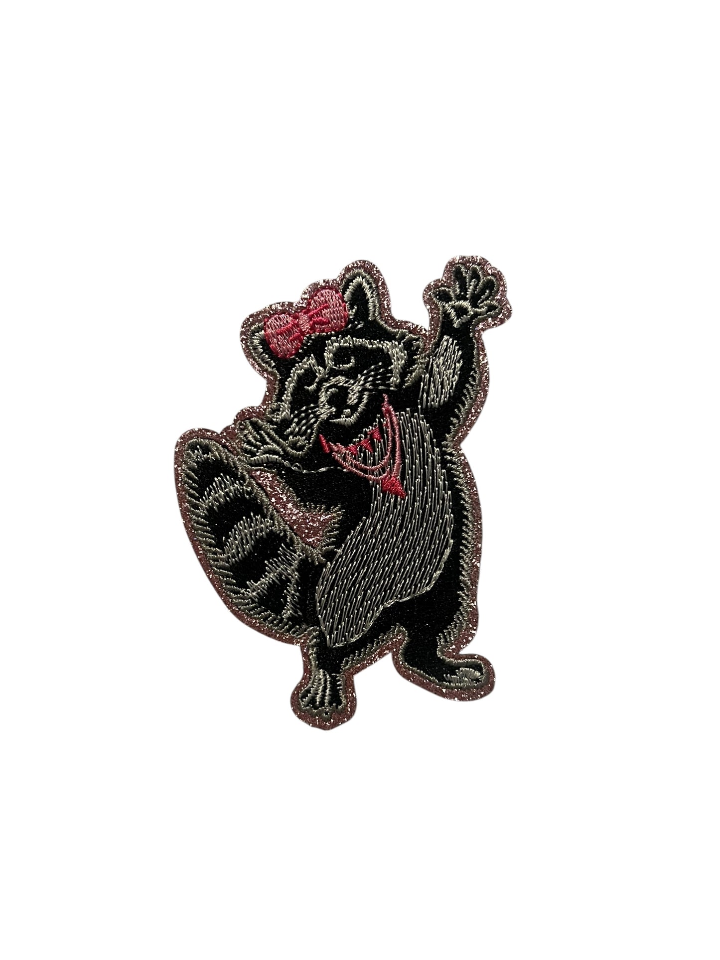 Pink bow raccoon