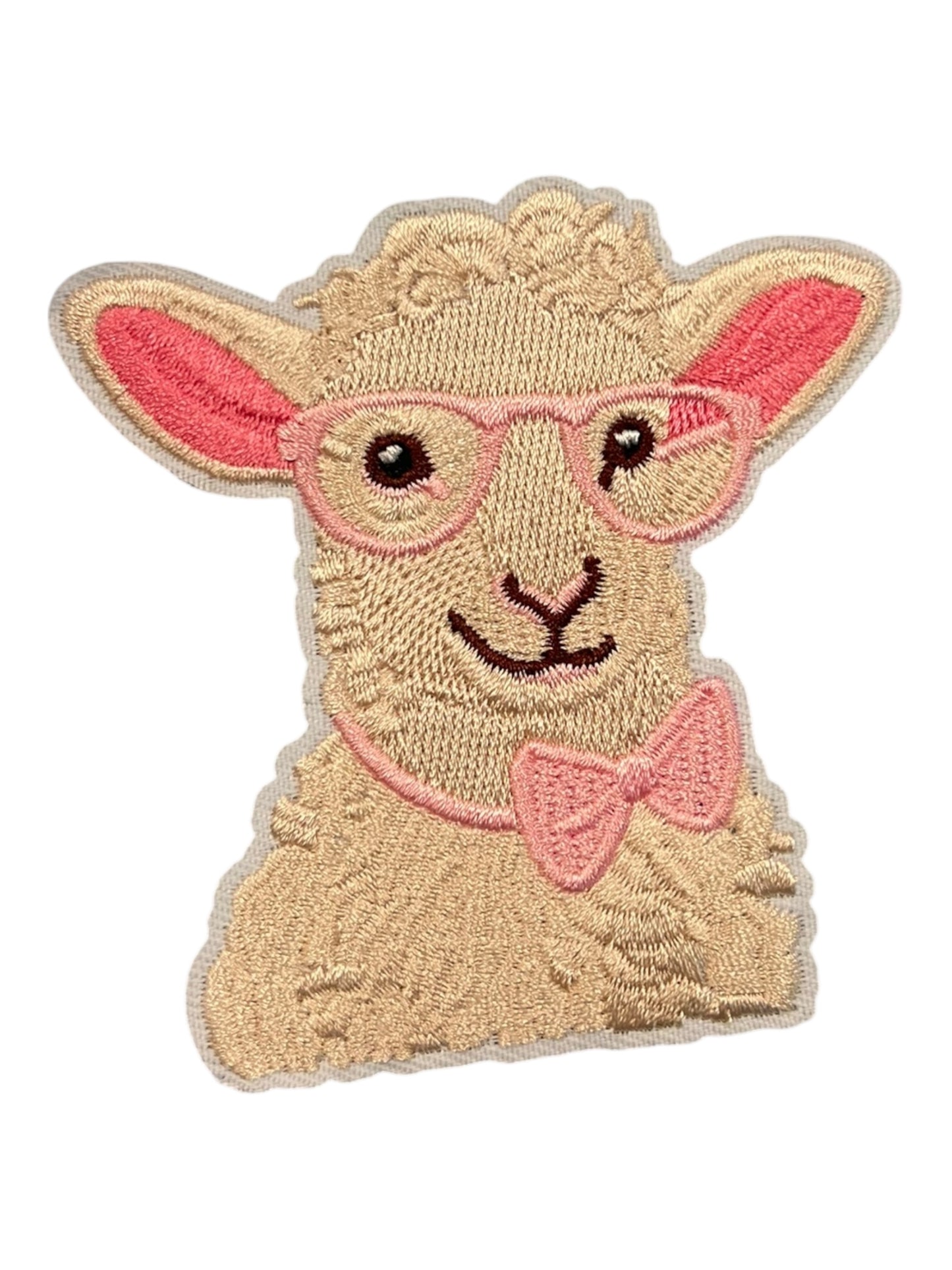 Sheep with pink ribbon