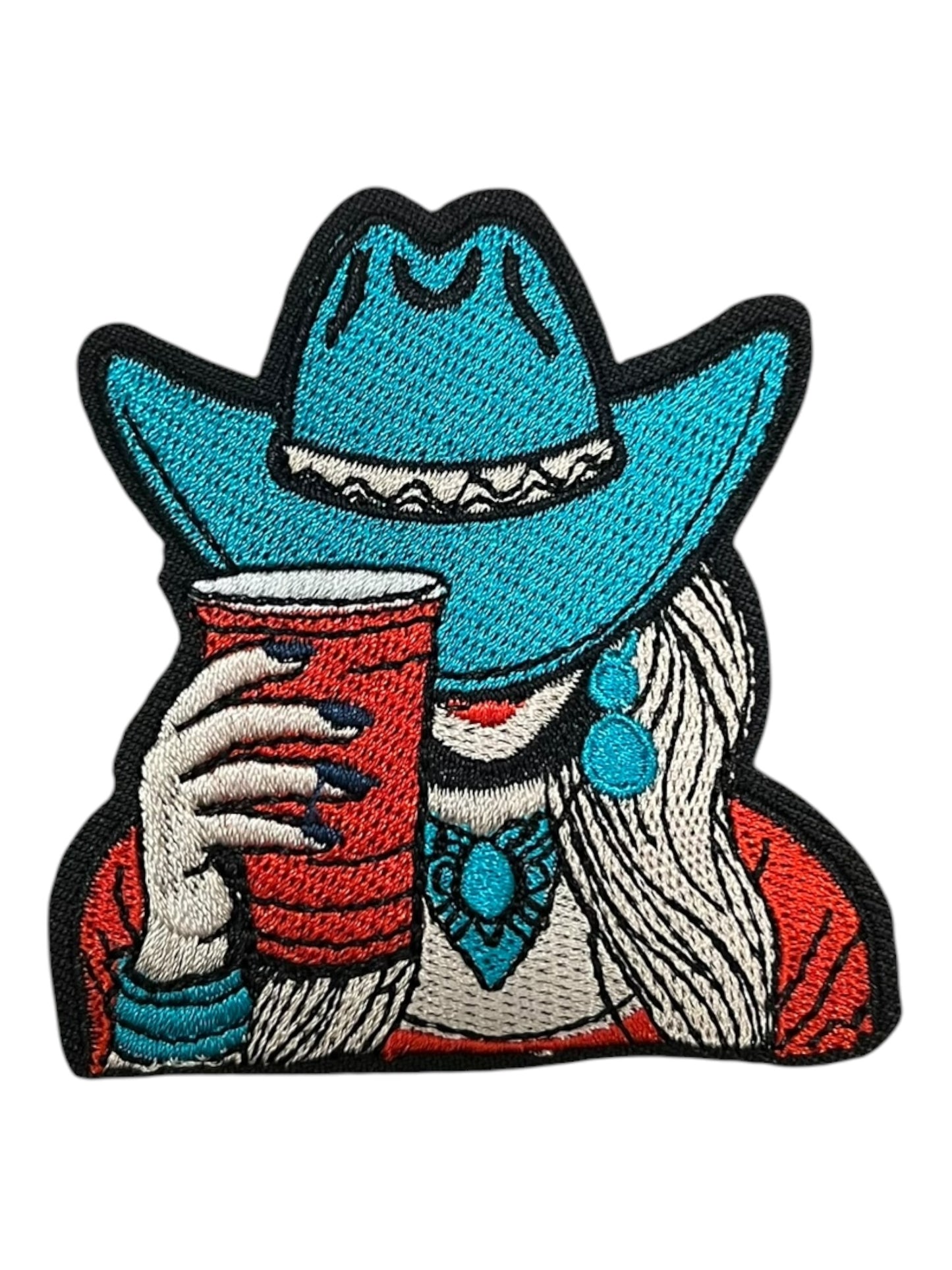 Cowgirl with a red cup