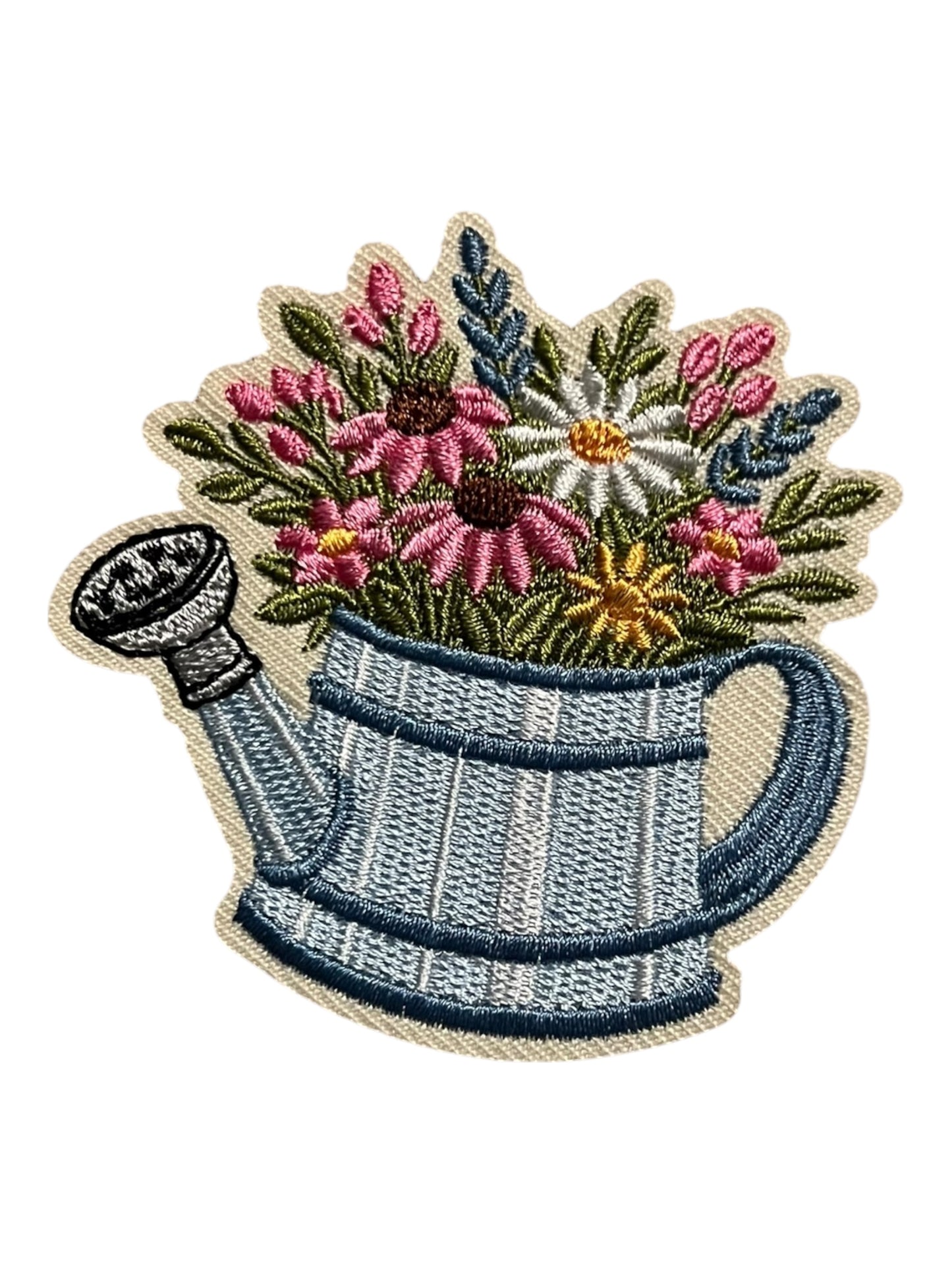 Flowers in a water can