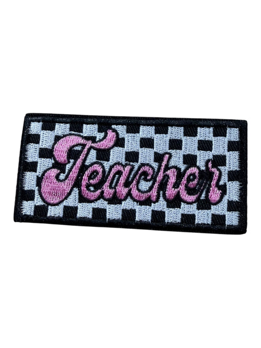 Teacher black white checkered with pink
