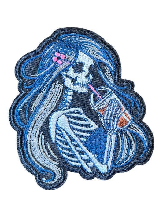 Skelly girl with drink blue  hair