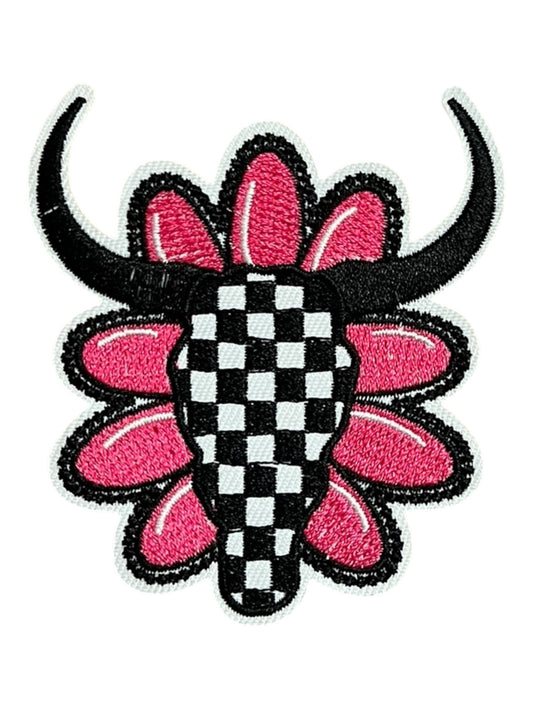 Pink stone and checkered steer head