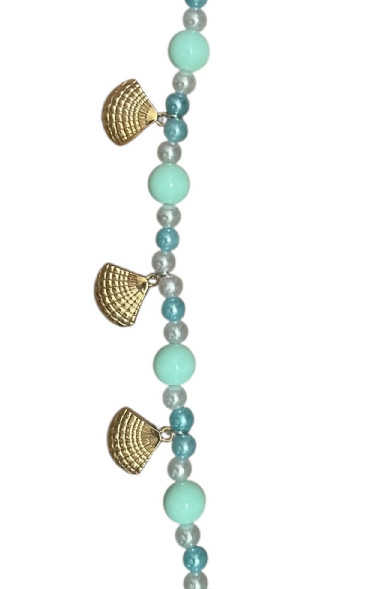Pearls and beads with gold shells