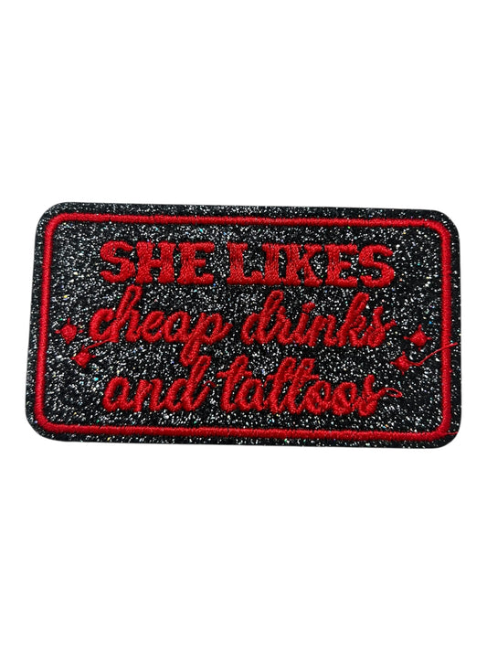 She likes cheap drinks and tattoos