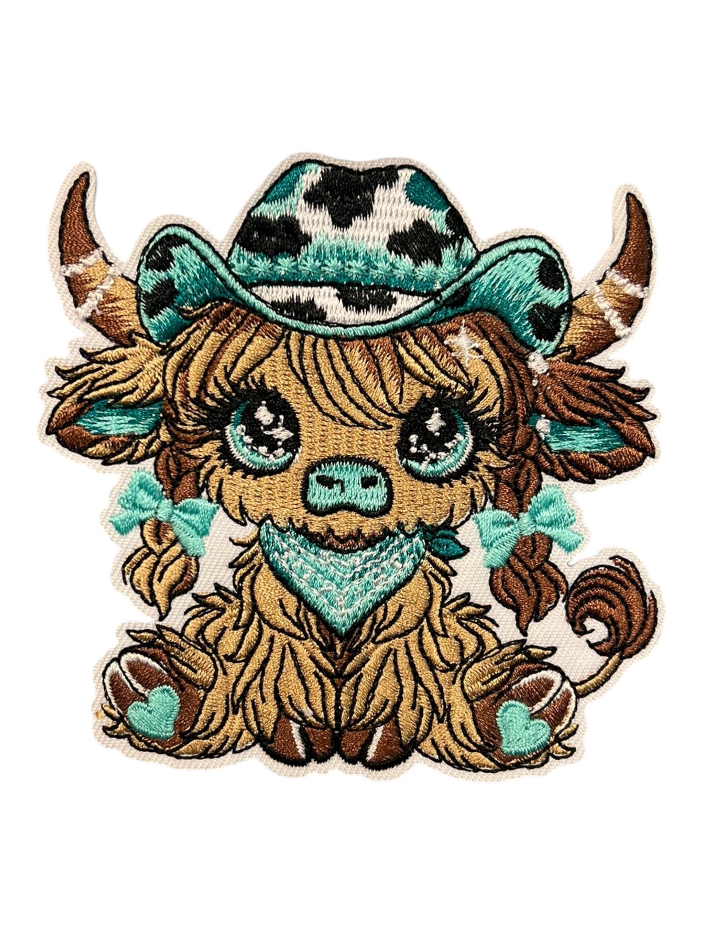 Cowgirl cow  with turquoise and black accessories