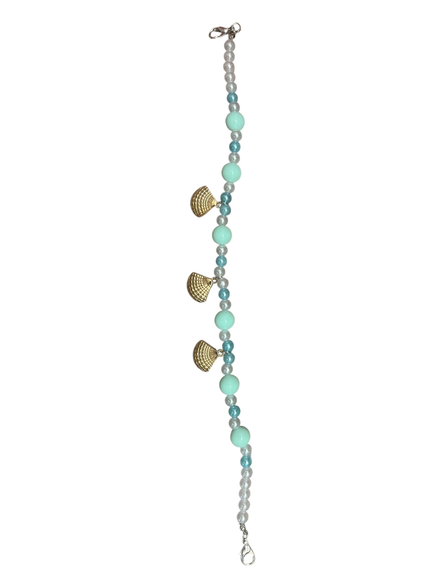 Pearls and beads with gold shells