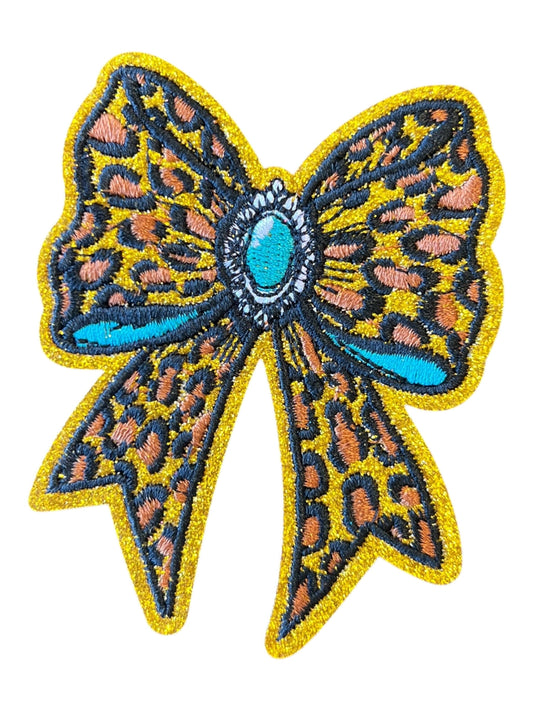 Leopard and turquoise bow