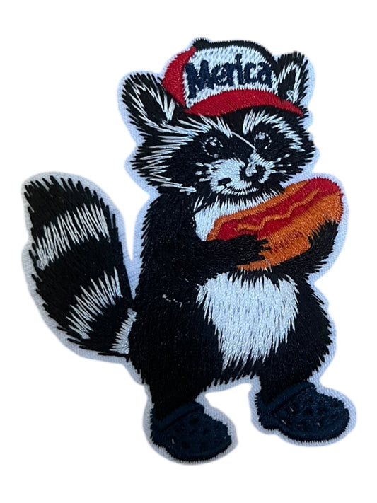 Merica raccoon with hot dog