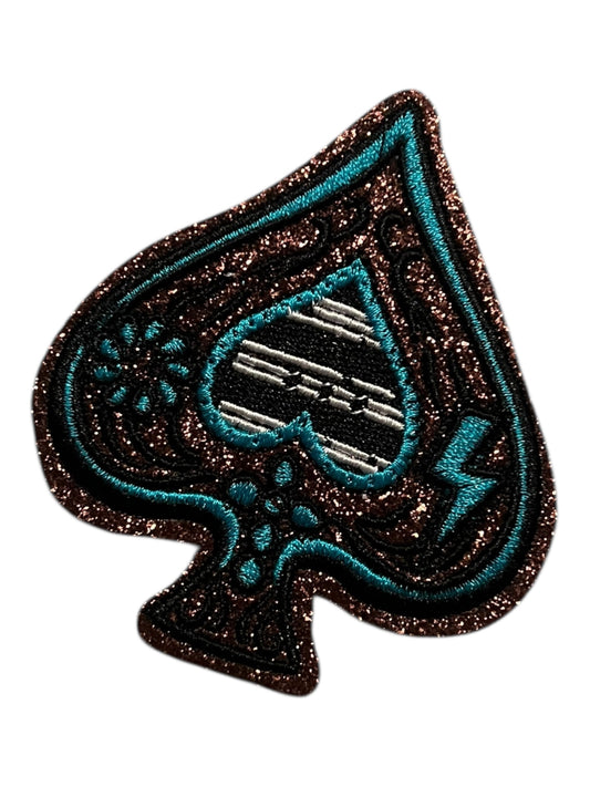 Glitter spade with turquoise