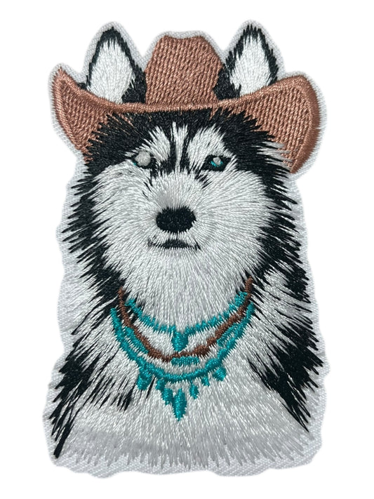 Husky with cowboy hat and turquoise