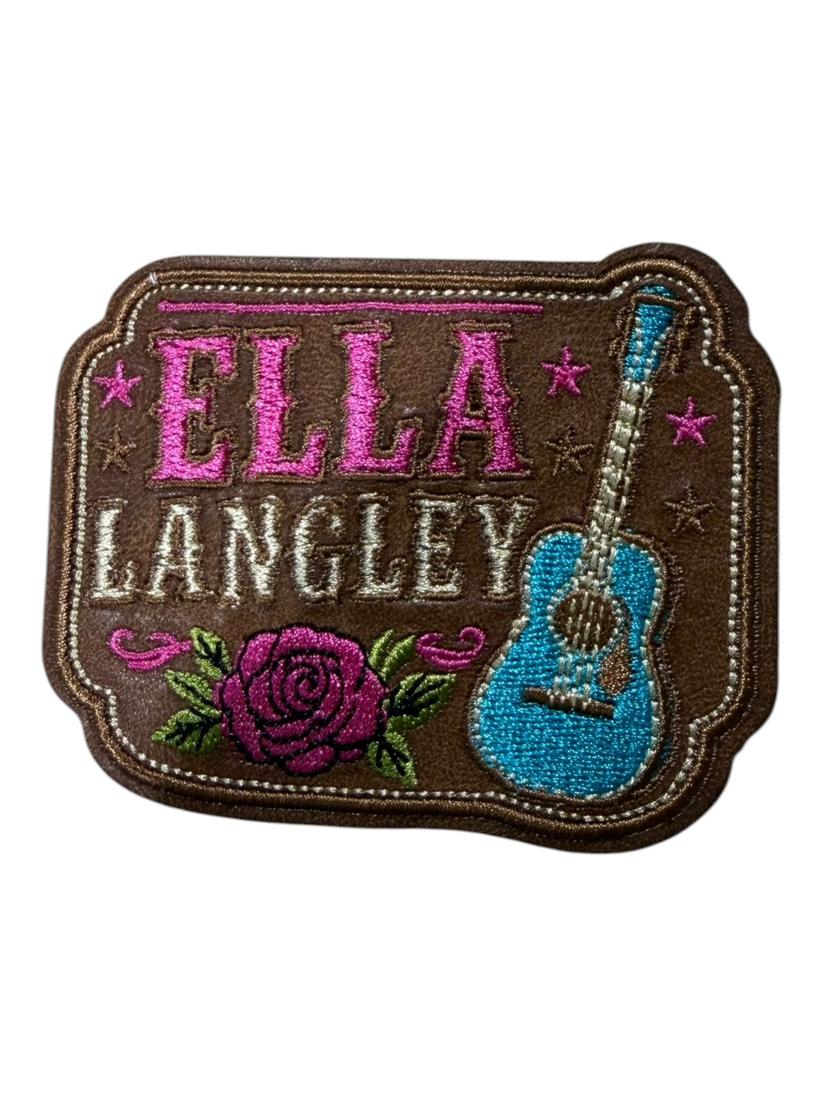 Pink Ella with turquoise guitar