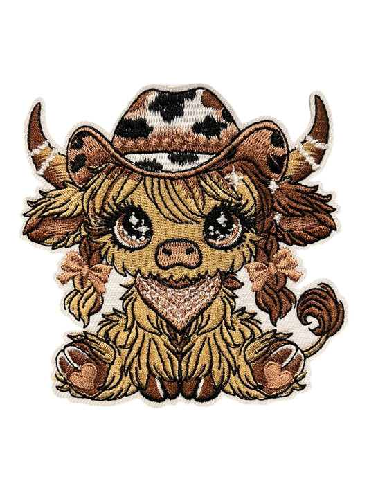 Cowgirl cow  with brown and black accessories