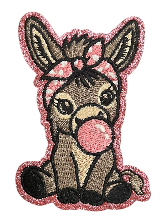 Baby donkey with bubble pink bow