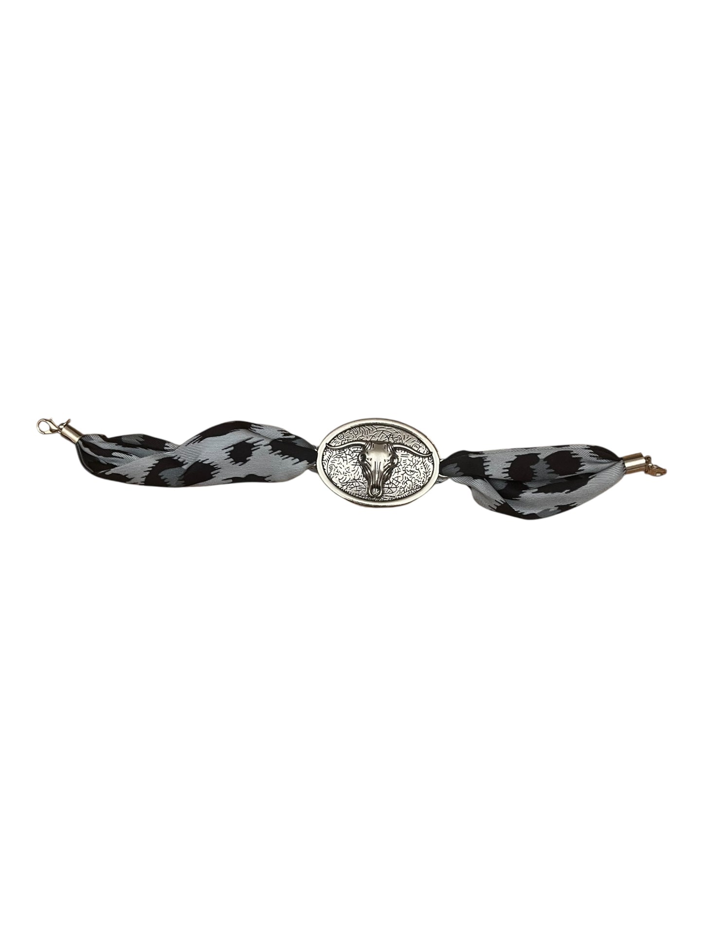 Cow print with a silver steelhead charm