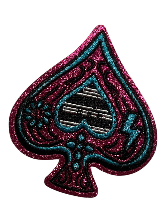 Hot pink glitter and turquoise spade