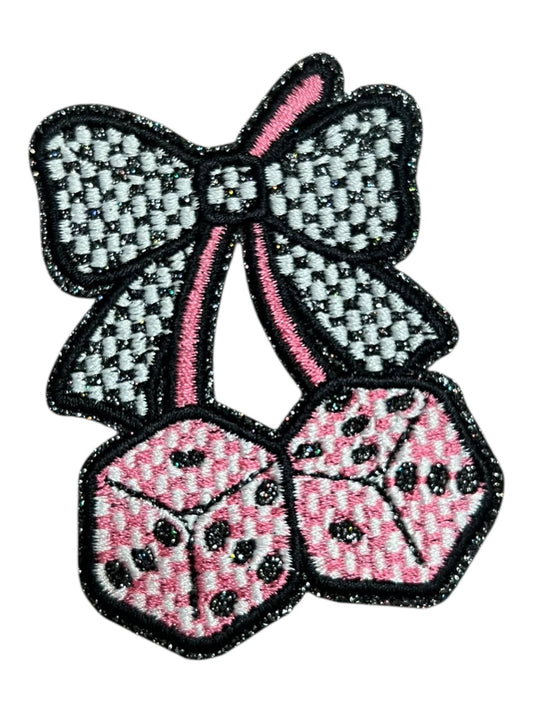 Pink dice with checkered bow