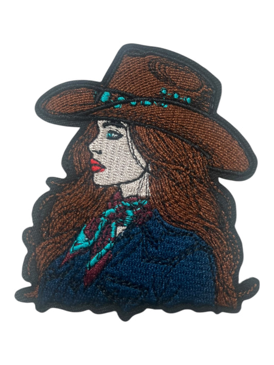 Cowgirl with brown and turquoise hat