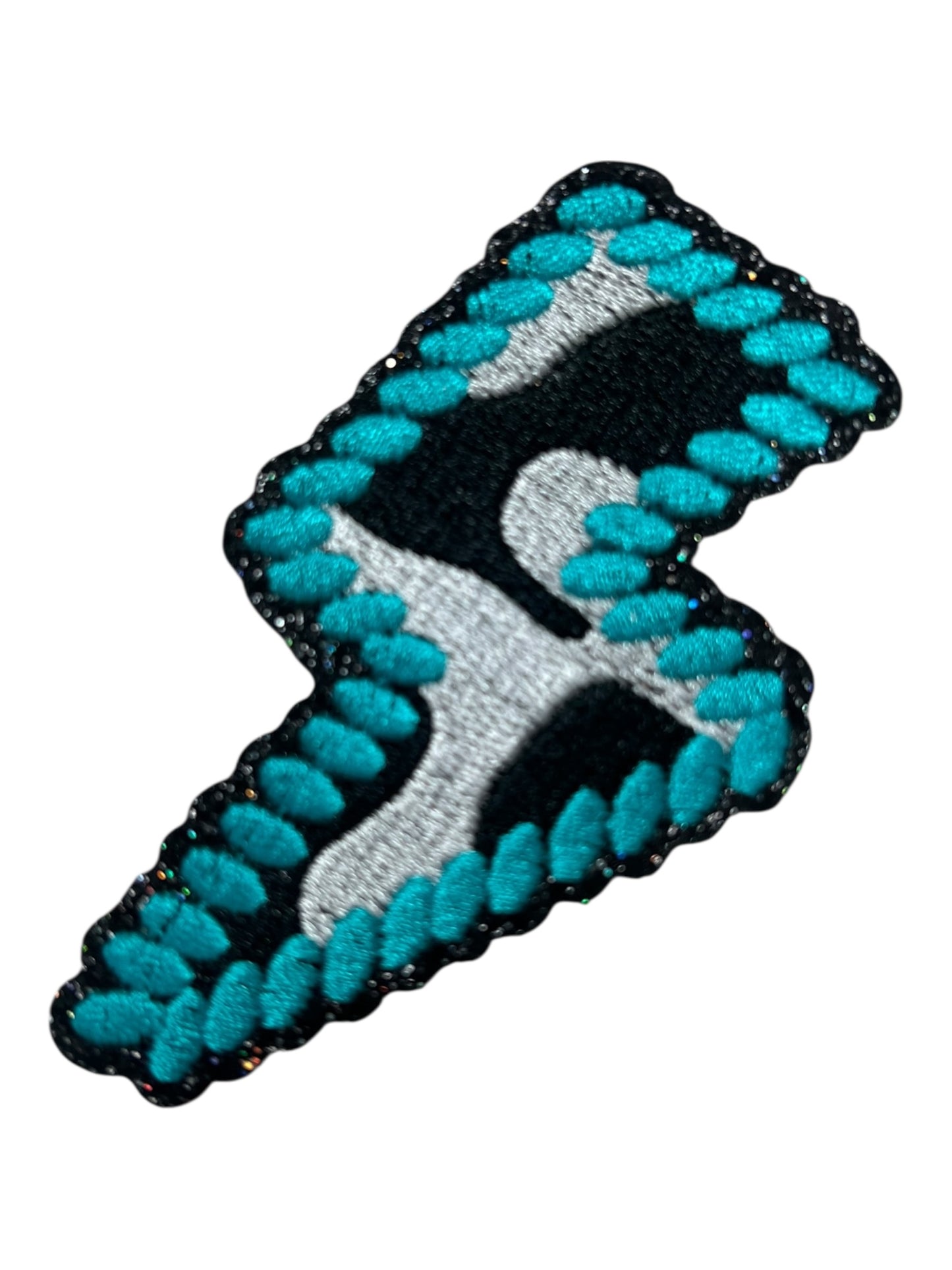 Cow print and turquoise lightning bolt