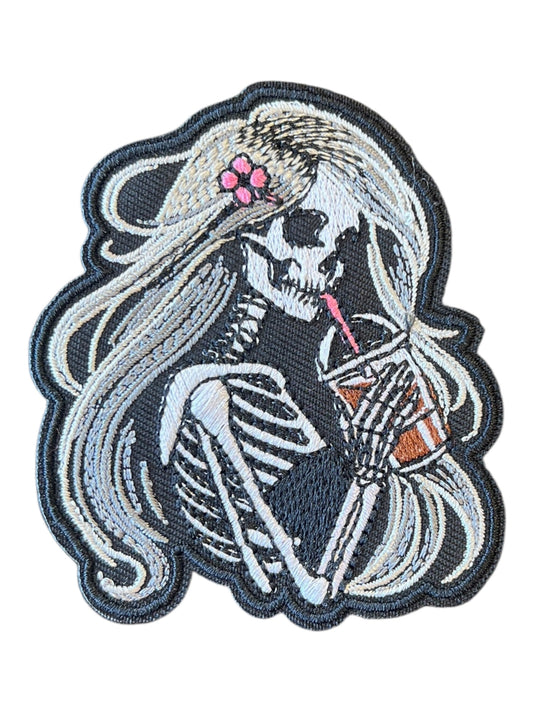 Skelly girl with drink beige hair