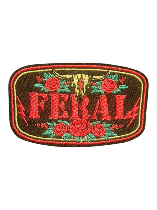 Feral with roses and steer skull