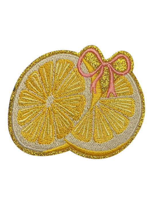 Lemon with pink bow