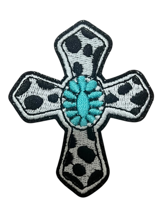 Cow print and turquoise cross