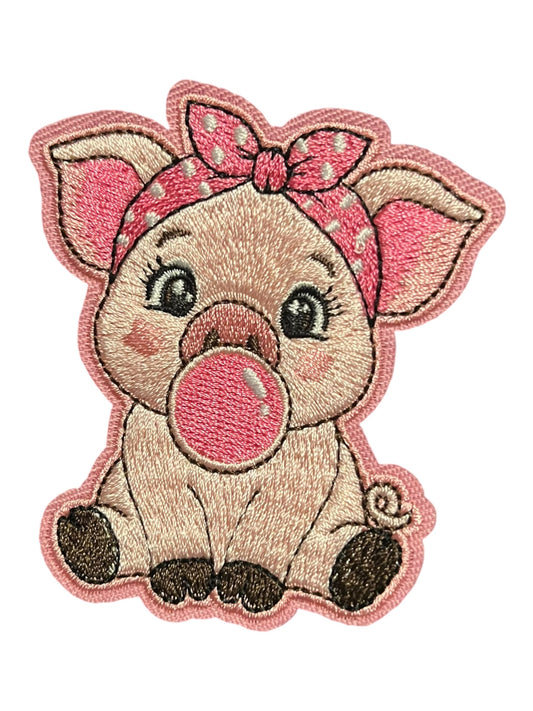 Baby pig with bubble pink bow