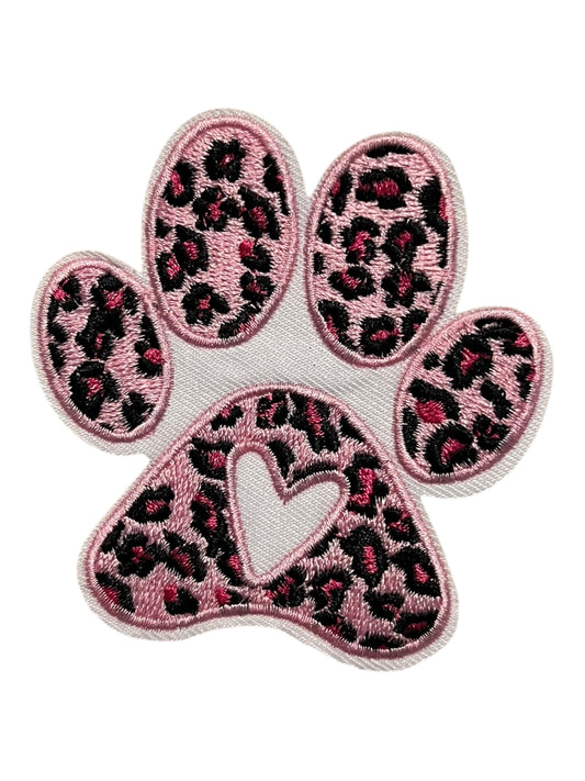 Pink leopard dog paw