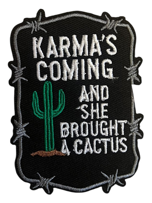 Karmas coming and she brought a cactus