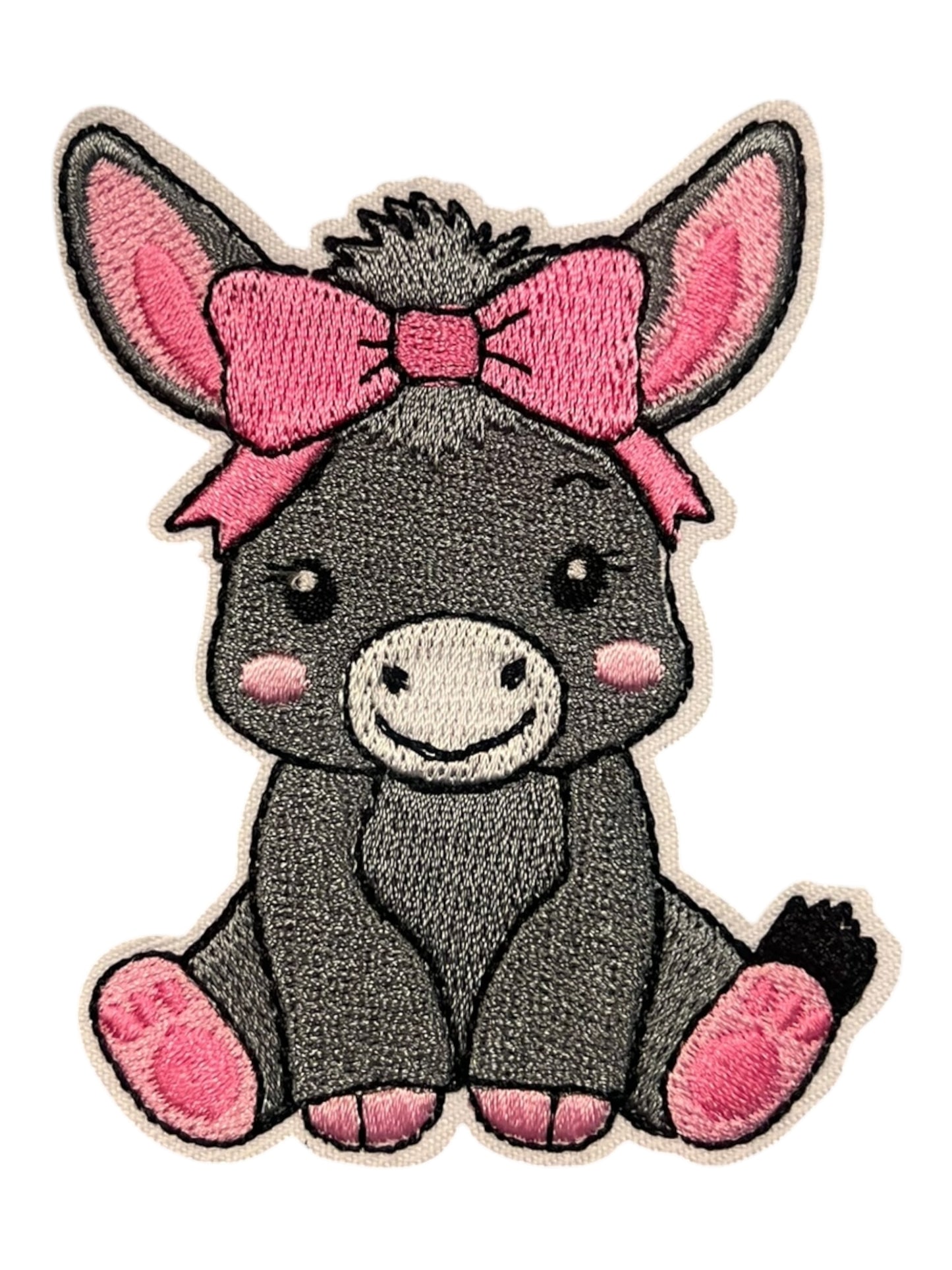 Donkey with pink ribbon