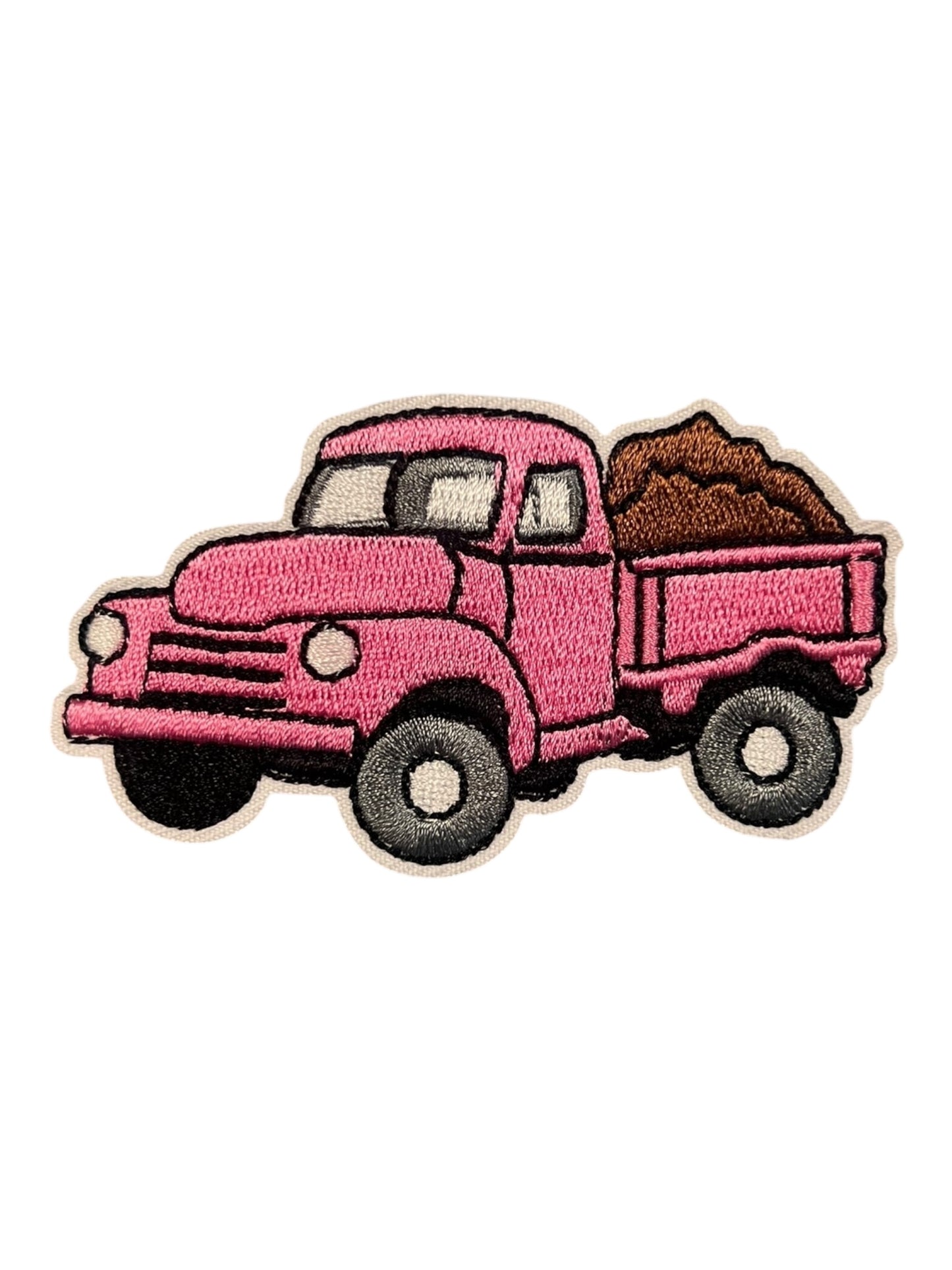 Pink truck with dirt