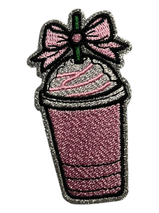 Drink with whipped cream and bow
