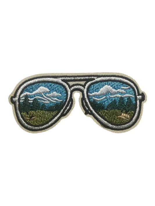 Aviator glasses with mountain scene
