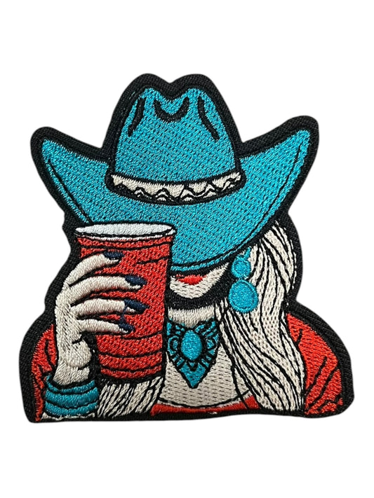 Cowgirl with  a red cup
