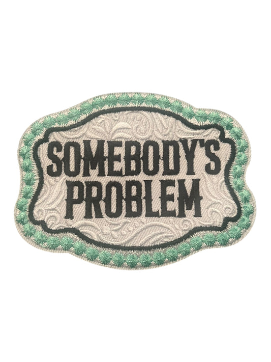 Somebody’s Problem buckle shape  with turquoise edge