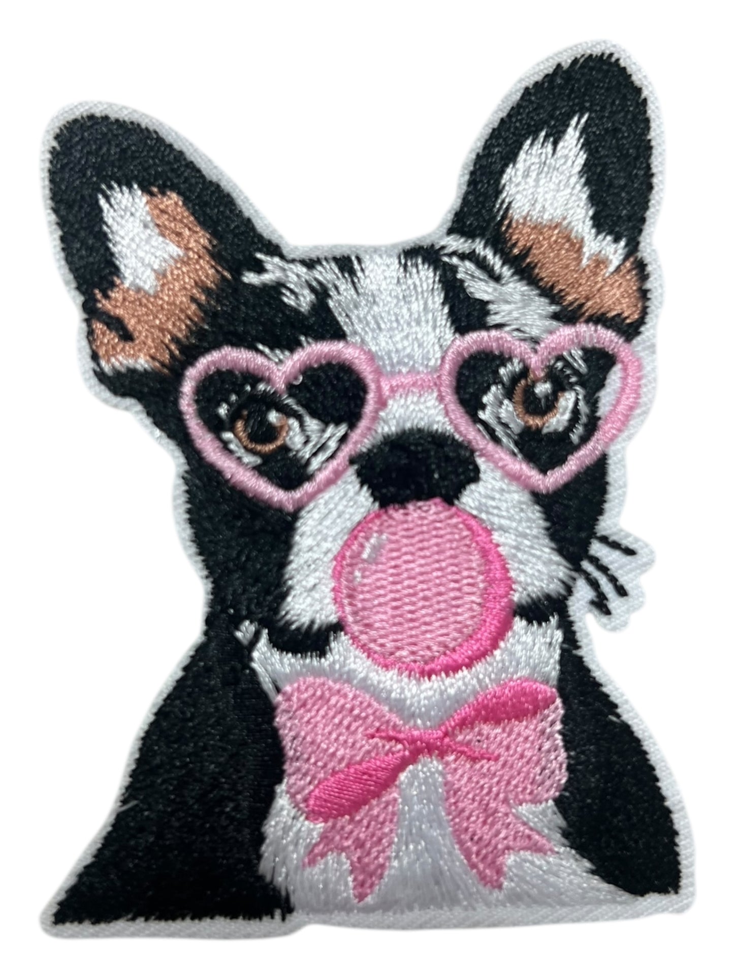 Schnauzer with pink bubble and bow