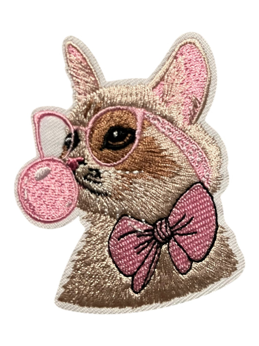 Cat with pink glasses, bow, and bubble