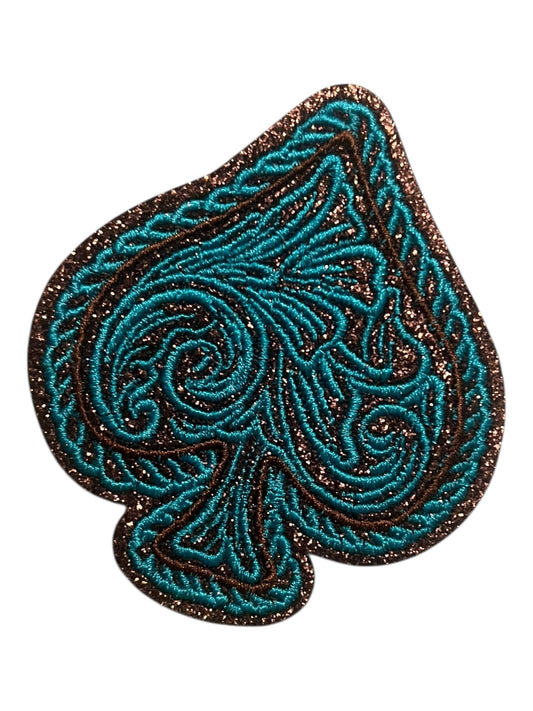 Glitter spade with turquoise