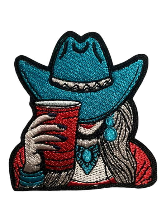 Turquoise Cowgirl and solo cup