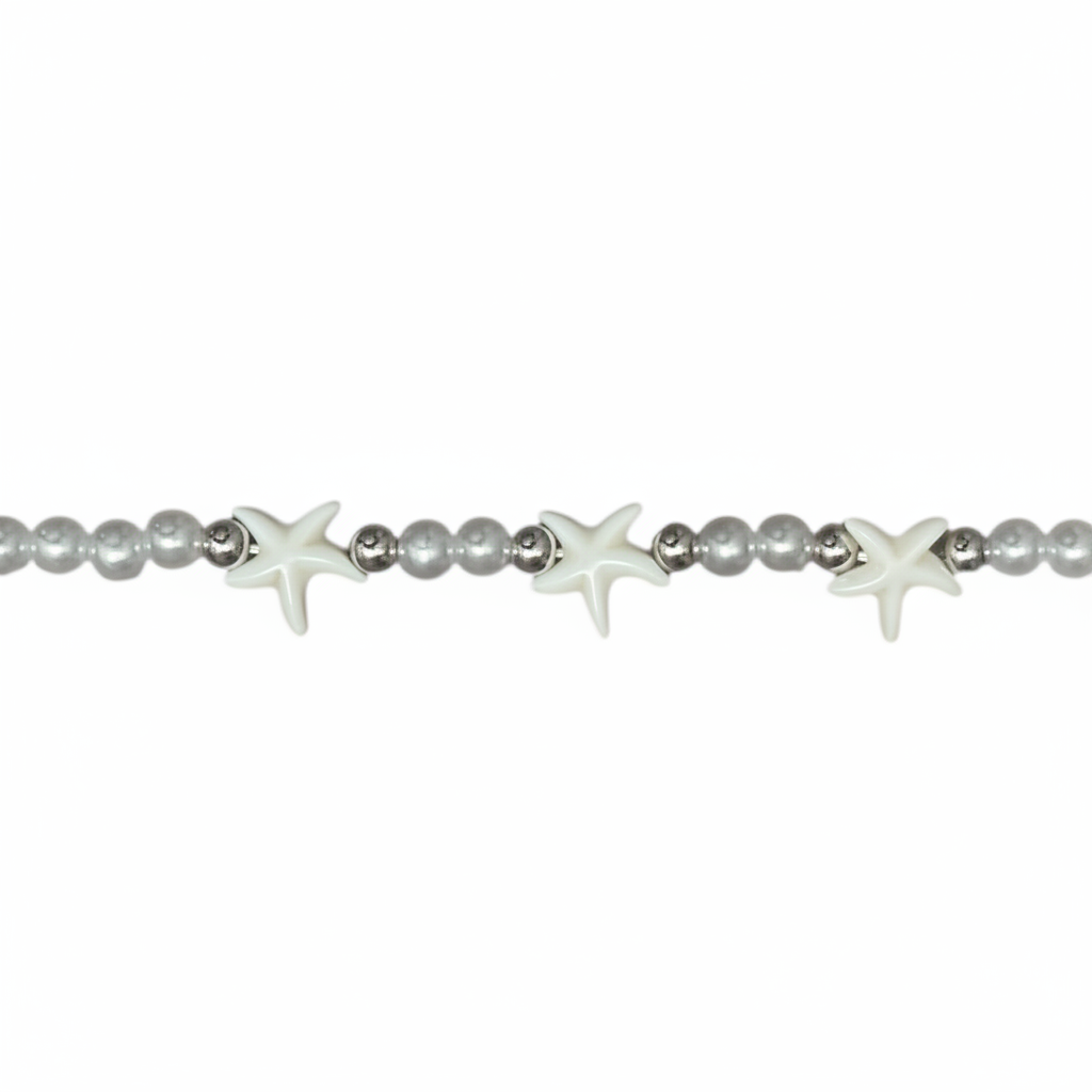 Pearls and starfish hat chain center zoomed close-up
